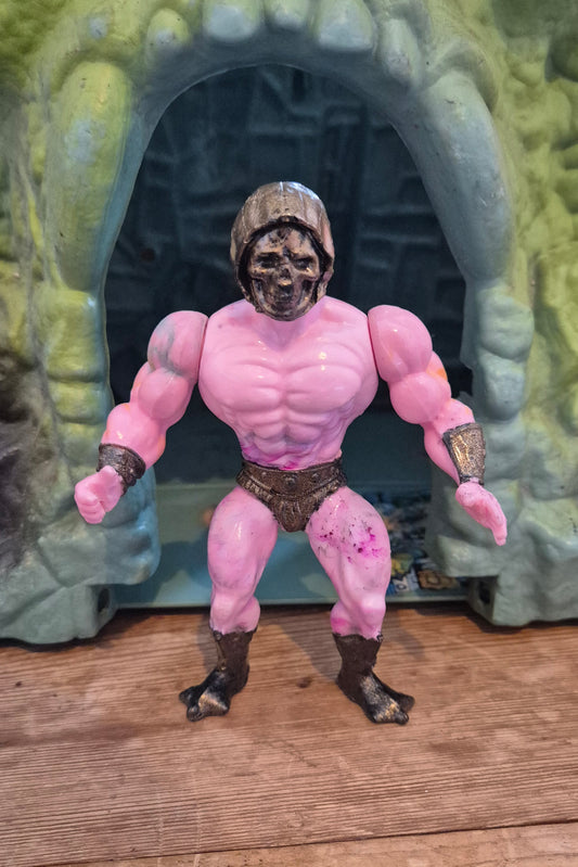 Skeletor pink swirl resin bootleg figure